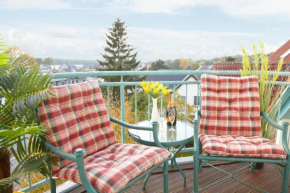 Ferienwohnung Tine mit Balkon, Fahrrädern und Strandkorb im Sommer, Zempin